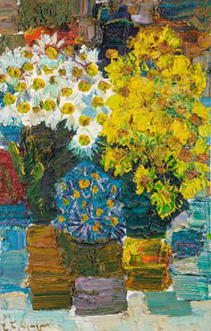 Brightly coloured flowers in vases 