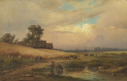 Cattle watering in a summer landscape